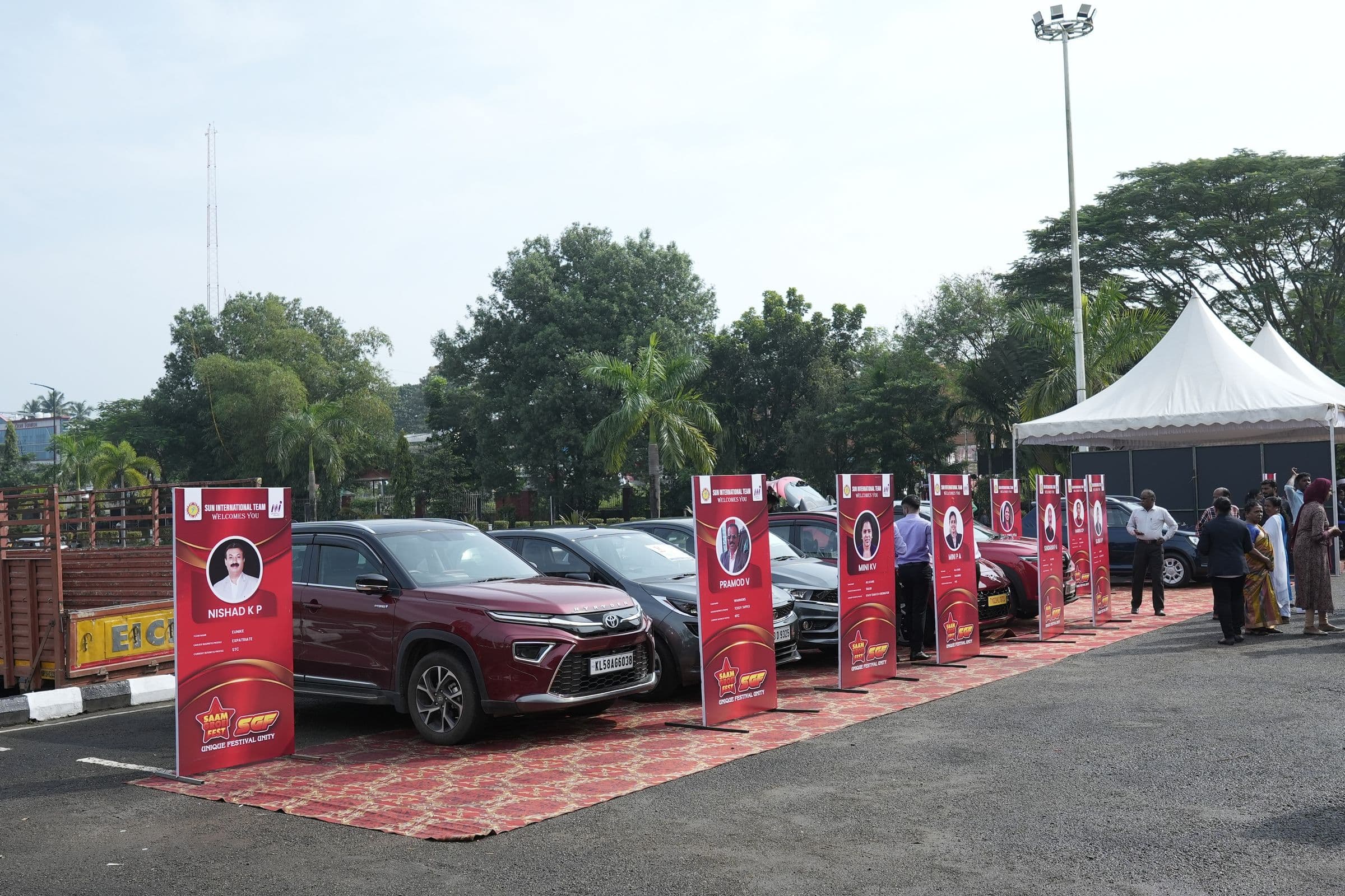 Cars displayed with branded standees at a Brilliant Study Centre event
