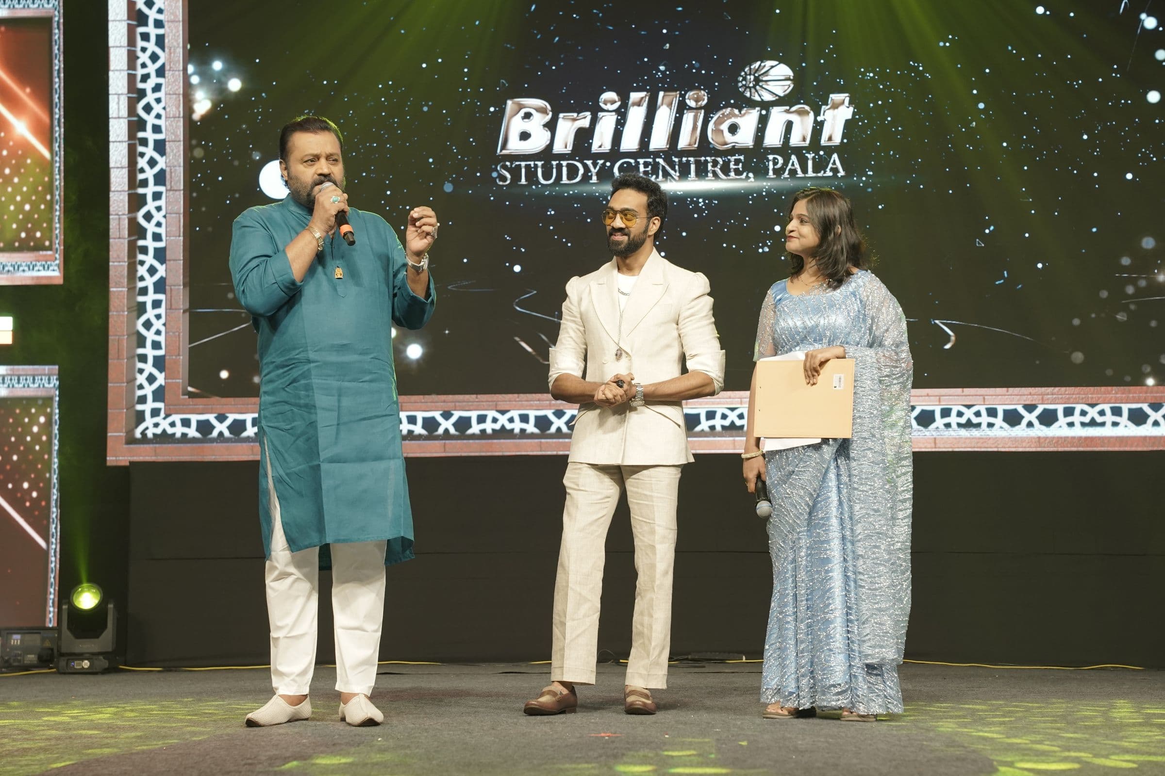 Guests on stage at a Brilliant Study Centre celebration
