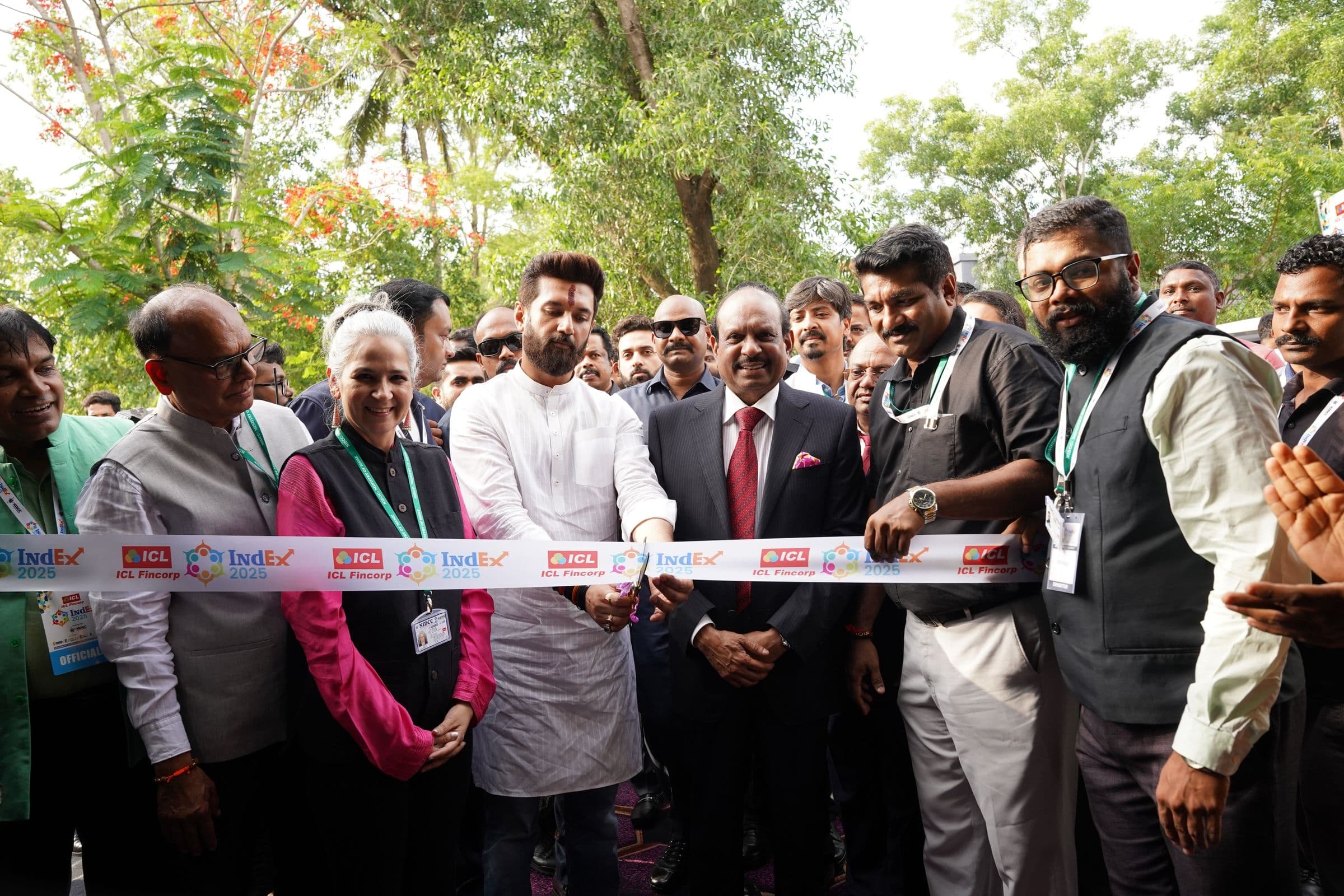 Guests cut the ribbon at an XES exhibition opening