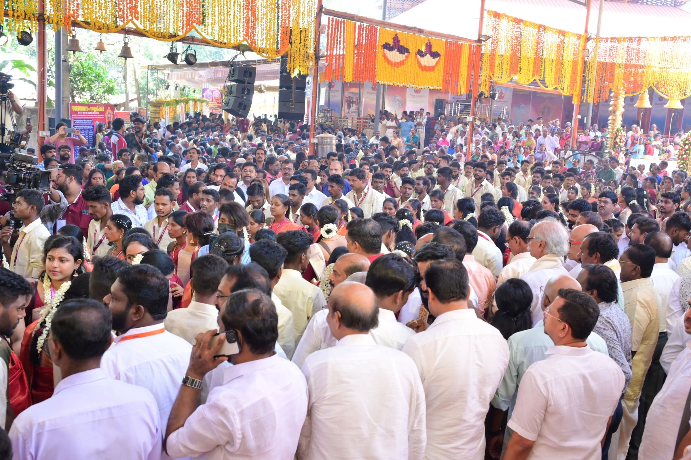 A dense crowd gathered at a large public celebration produced by XES