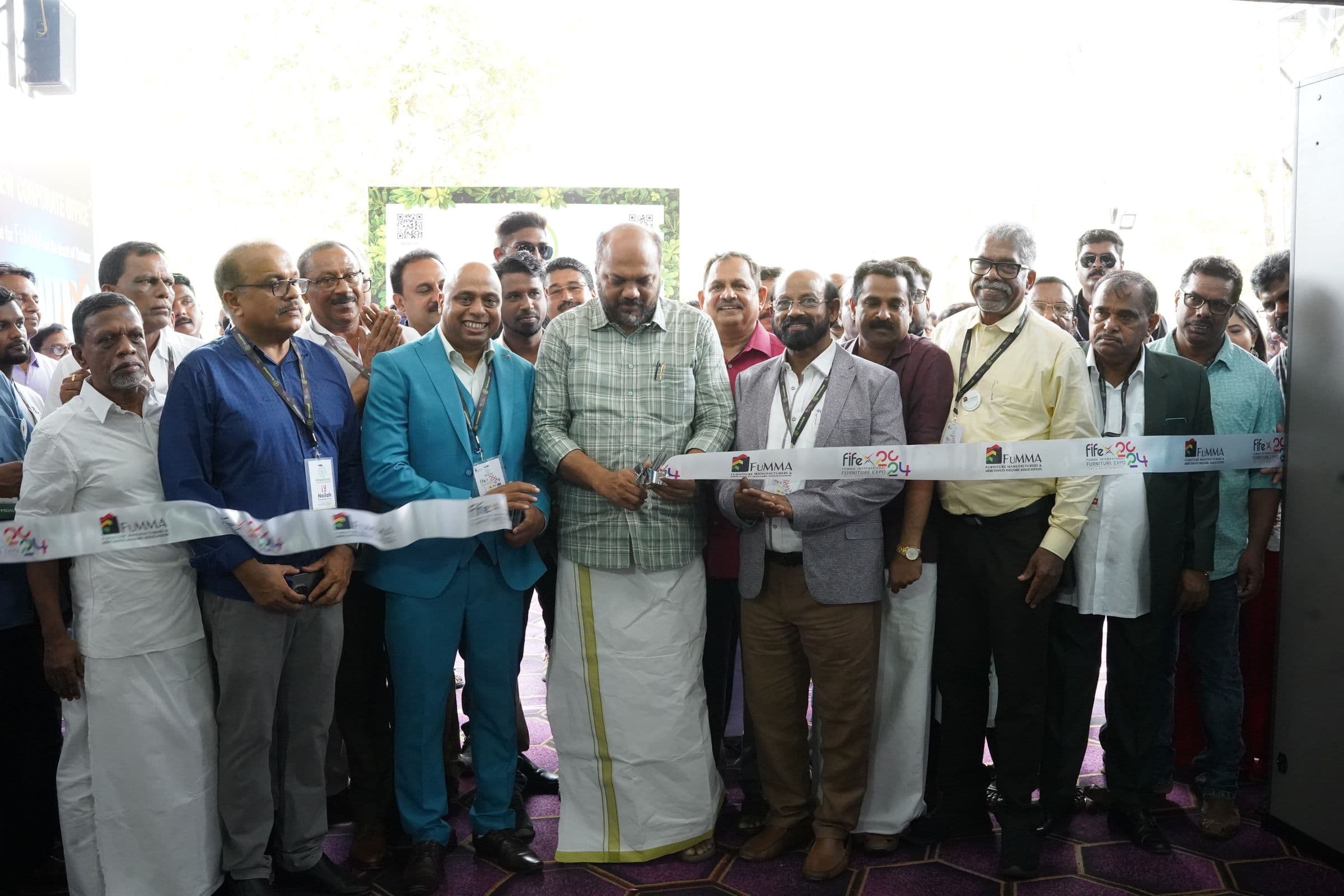 Organisers and guests at the FIFEX ribbon-cutting