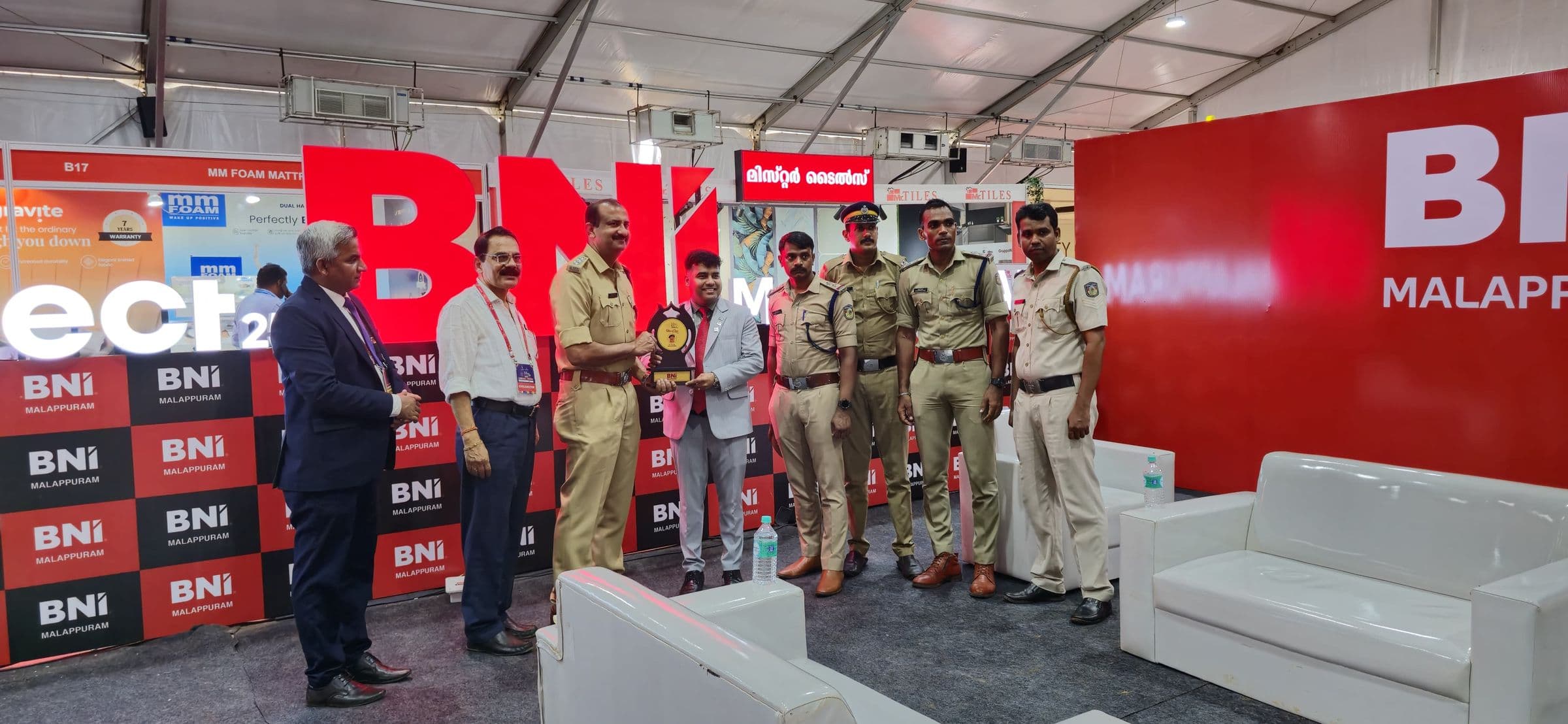 Guests and police officers at a stall at KL-10 Business Expo 2025