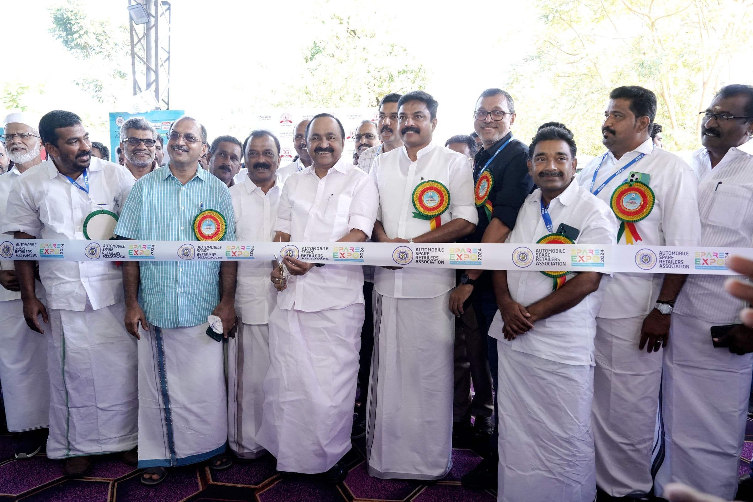 Dignitaries cut the ribbon to open Spare Expo
